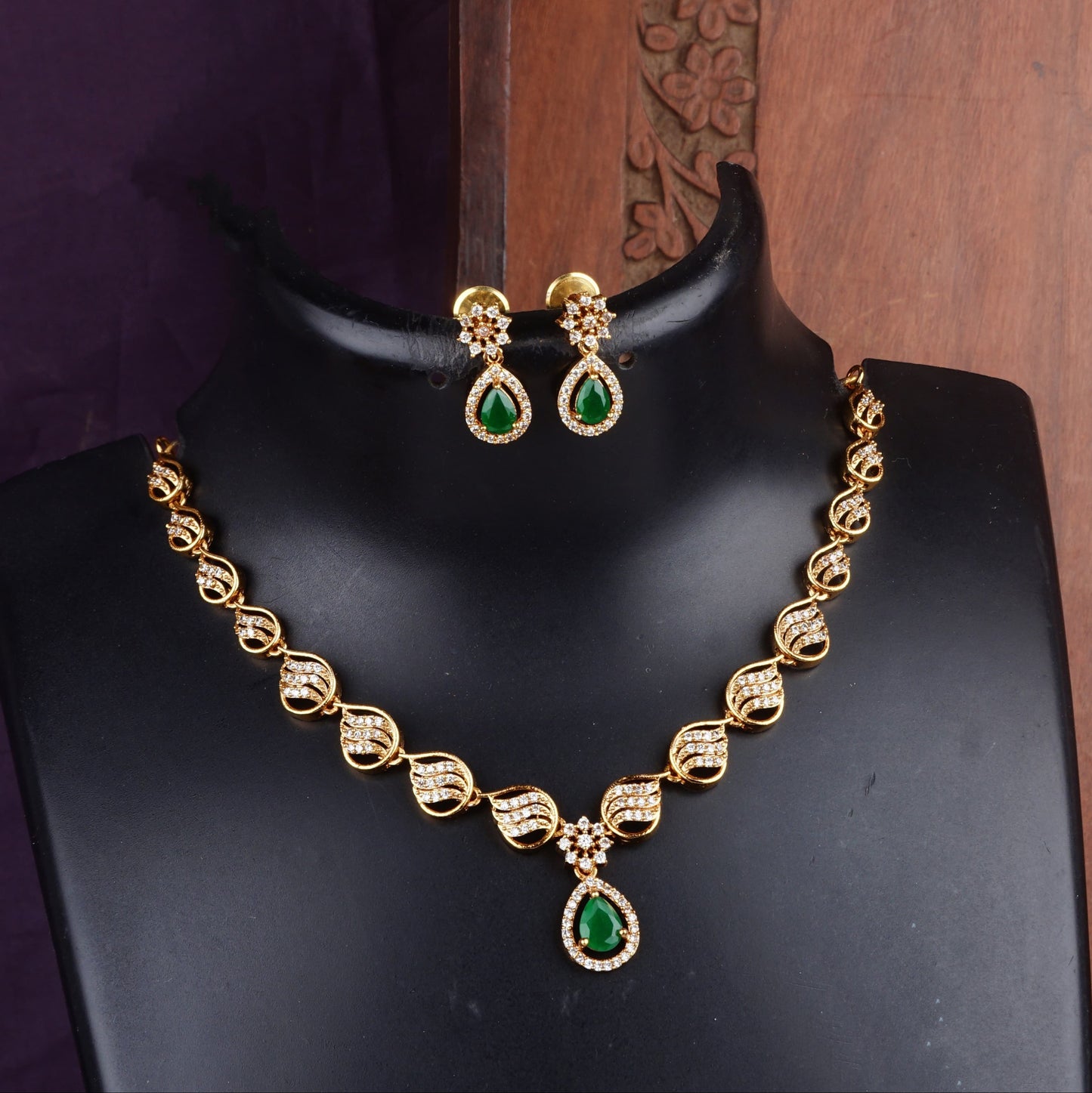 Gold-Toned Necklace with Emerald Accents