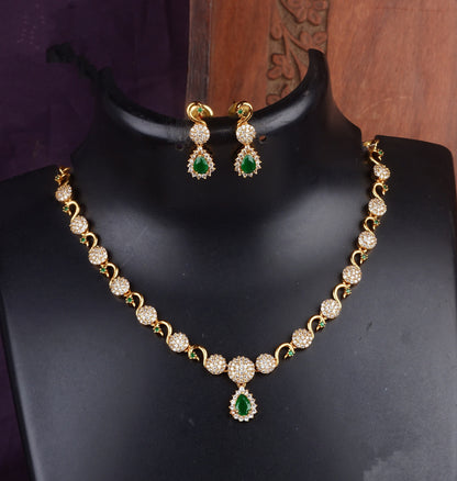 A Gold and Gemstone Necklace Set