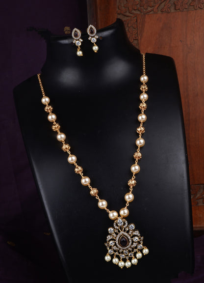 A Pearl and Gold Statement Necklace with Diamond Accents