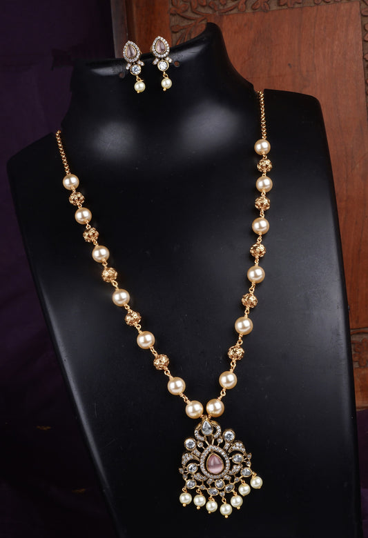 A Pearl and Gold Statement Necklace with Diamond Accents