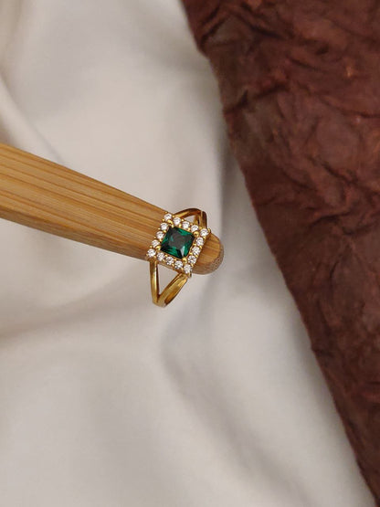 Gold Ring with Emerald Centerpiece